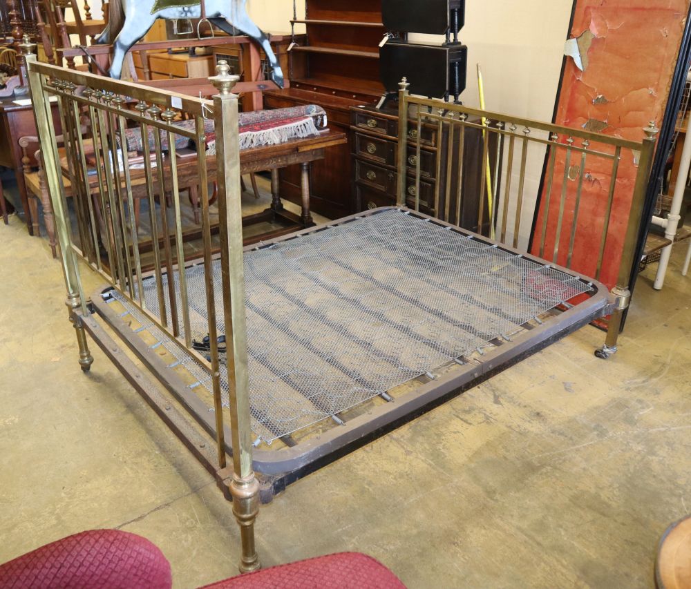 An early 20th century squared brass double bed frame, W.150cm